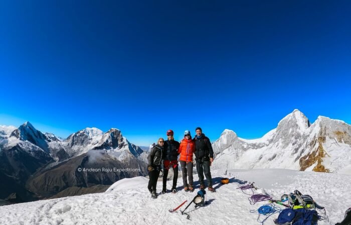 Clients from Germany and Spain on the summit of Nevado Pisco
