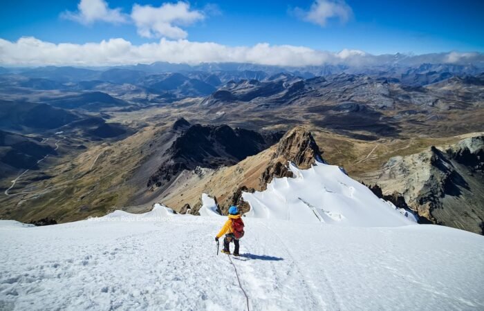 Our client Mario from Argentina descending from the Huarapasca summit