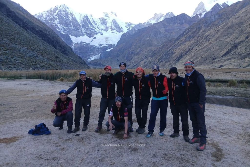 Andean Raju Expeditions guides with a trekking group in the Cordillera Huayhuash