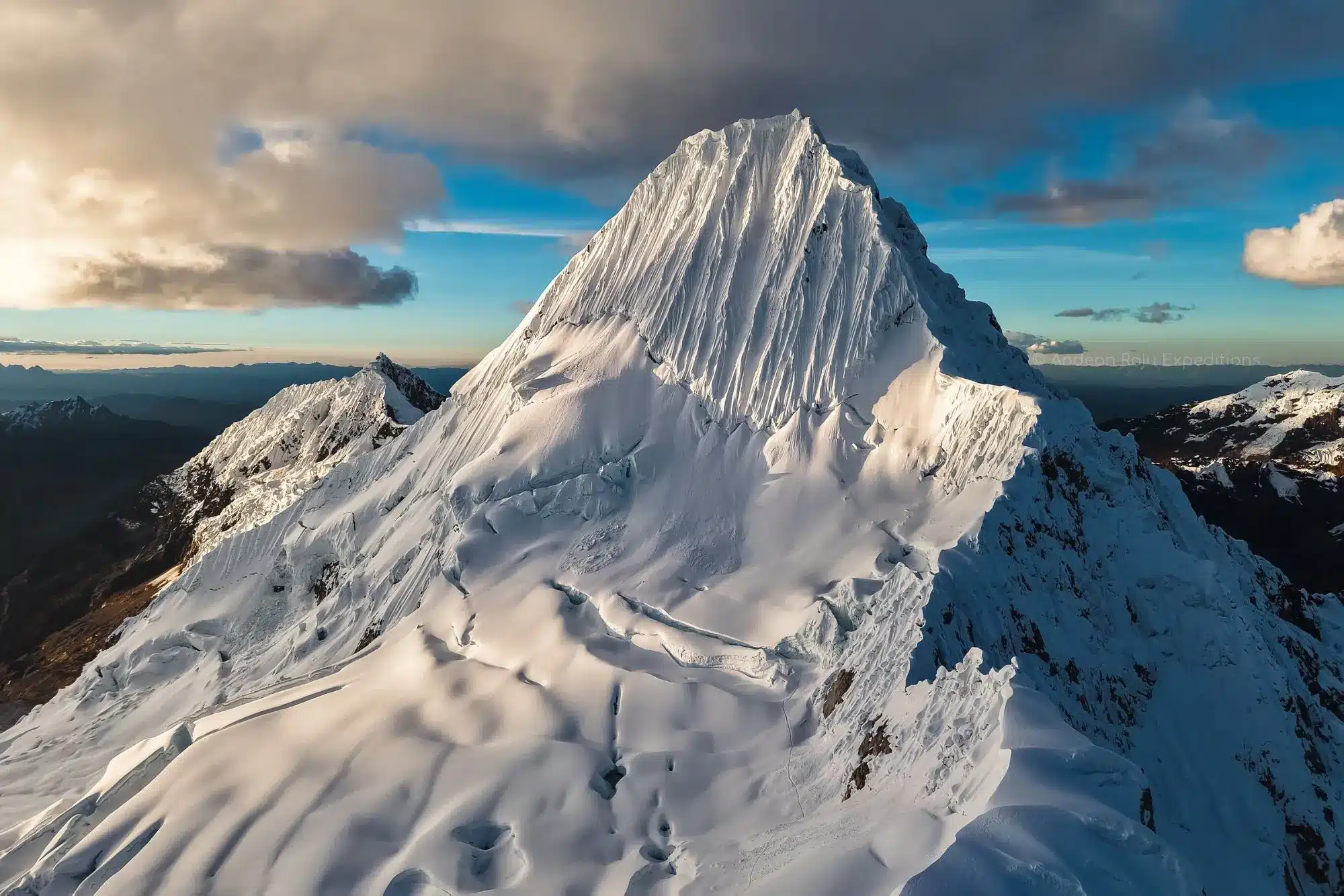 Alpamayo’s southwest face glowing at sunrise, Cordillera Blanca, Peru