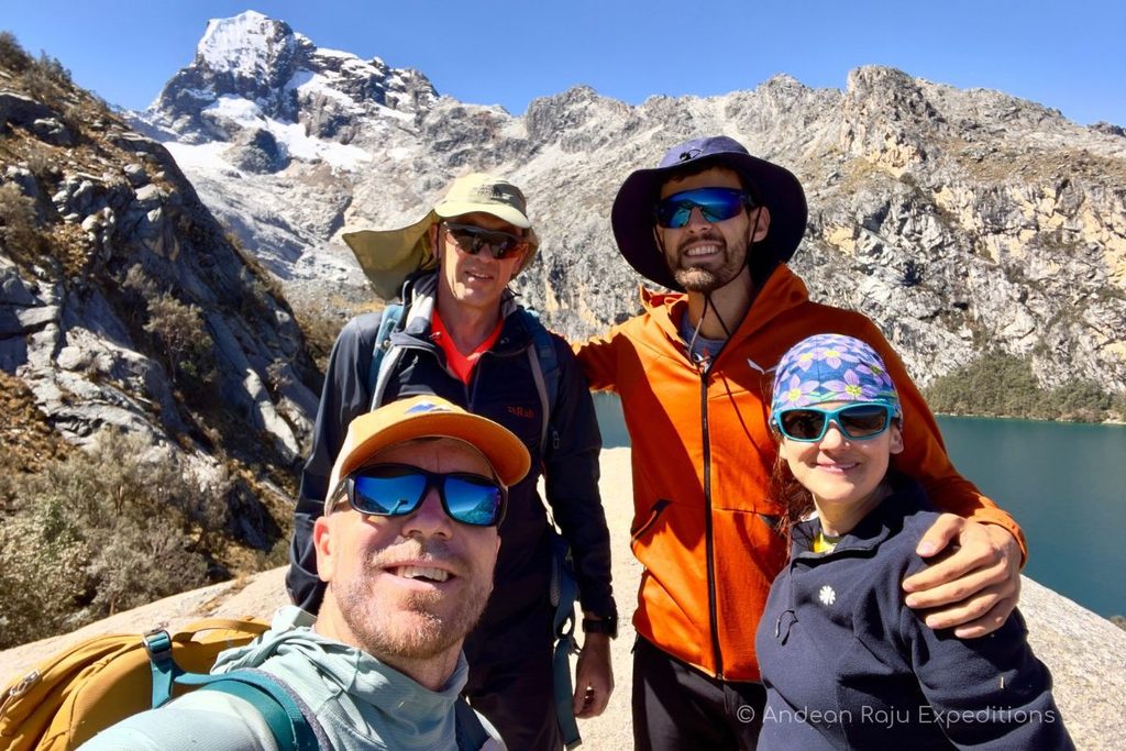 Trekkers at Laguna 69 during an acclimatization hike before climbing Alpamayo
